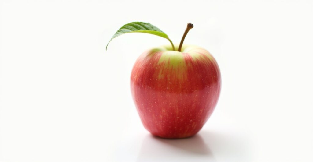 A single, perfectly presented Honeycrisp apple showing its characteristic red and yellow coloring